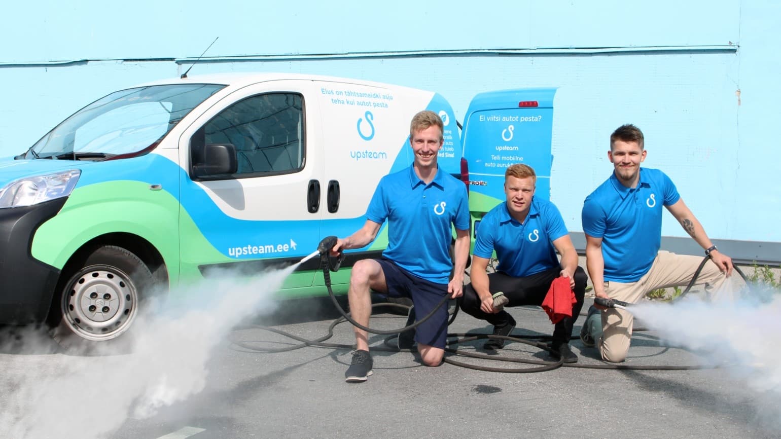 Team washing vehicles